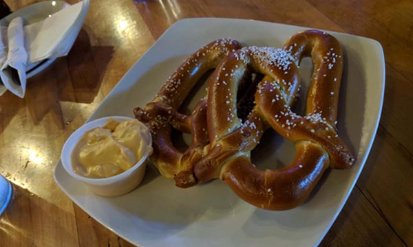 Green Bay Distillery pretzel served with beer cheese.